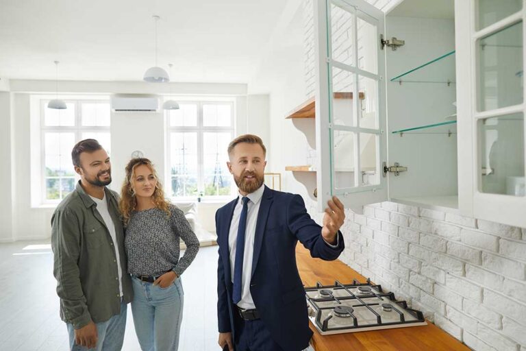 A homeowner reviews a checklist while preparing a clean, well-lit home for open house visitors.